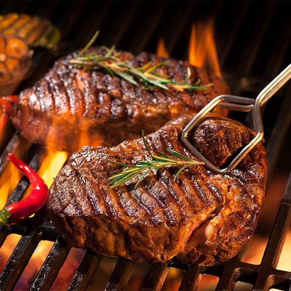 beef steaks on a grill