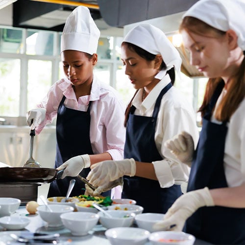 Students cooking in the kitchen