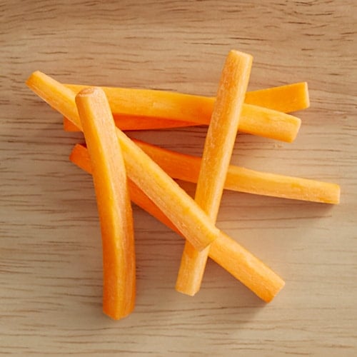 batonnet carrots on a cutting board