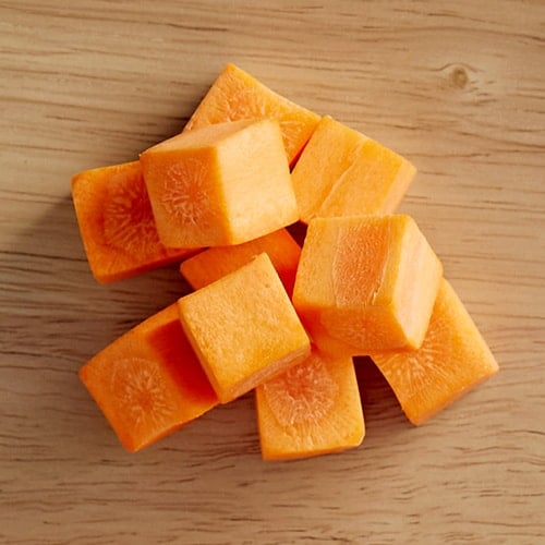 chopped carrots on a cutting board