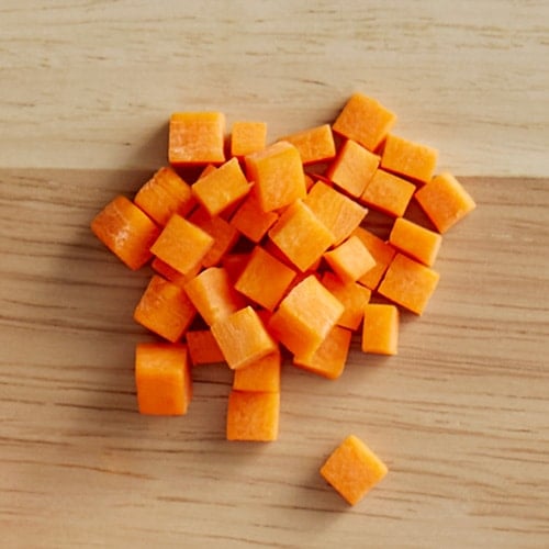 diced carrots on a cutting board