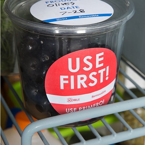 use first sticker on container of black olives