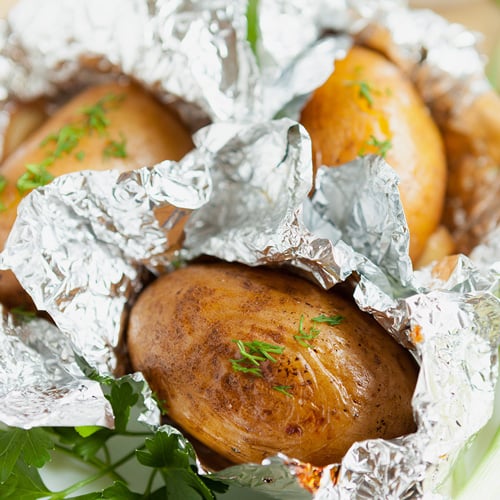 Potatoes baked in foil with herbs