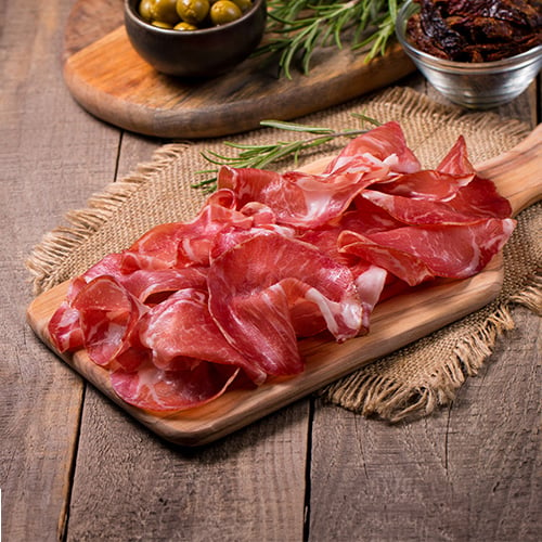 Italian slices of coppa, capocollo, capicollo, bresaola or cured ham with rosemary.