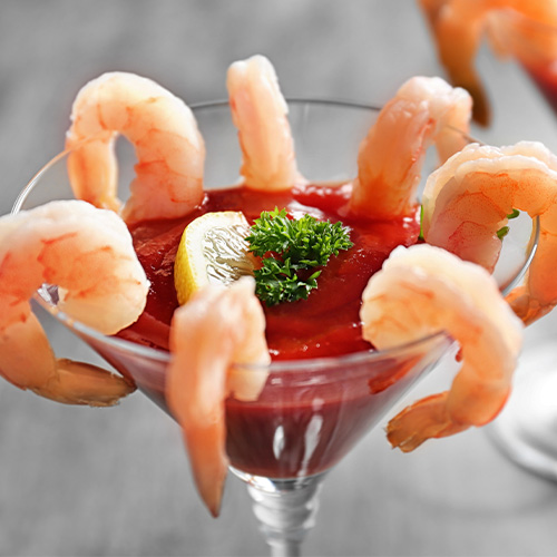 Cocktail sauce with shrimp in a glass