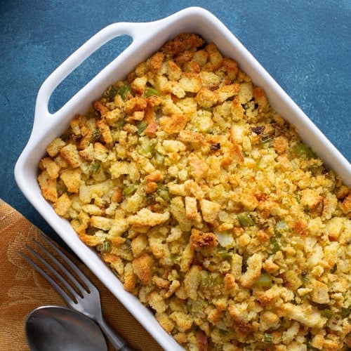 stuffing made using english muffins in a casserole dish