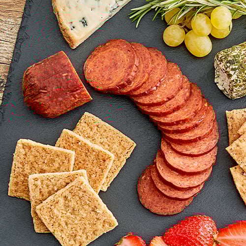 Summer Sausage on a charcuterie board