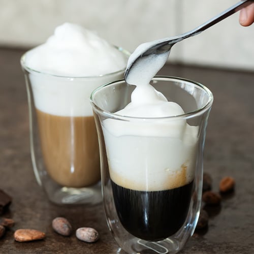 glass with frothed milk