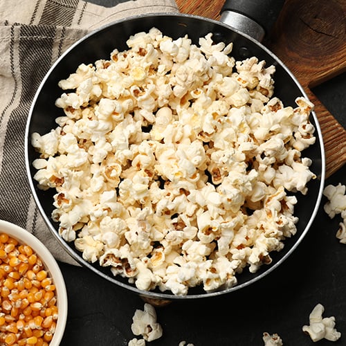 aerial view of popped popcorn in a pan