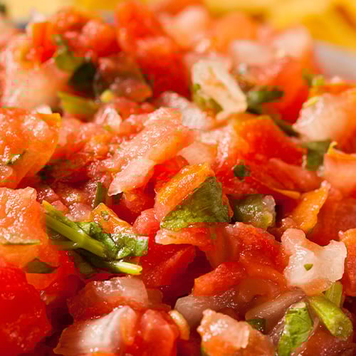 Closeup of cilantro and tomato