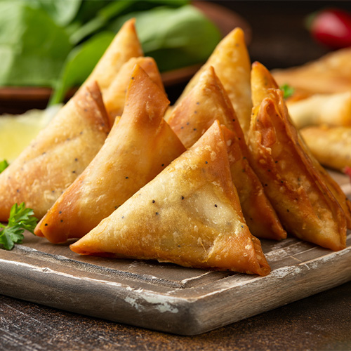 Close up of Veggie Fried samosas