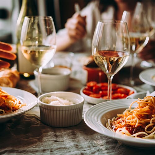 Closeup of wine and other italian food
