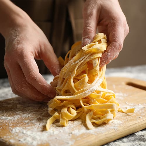 Closeup of Hands making pasta