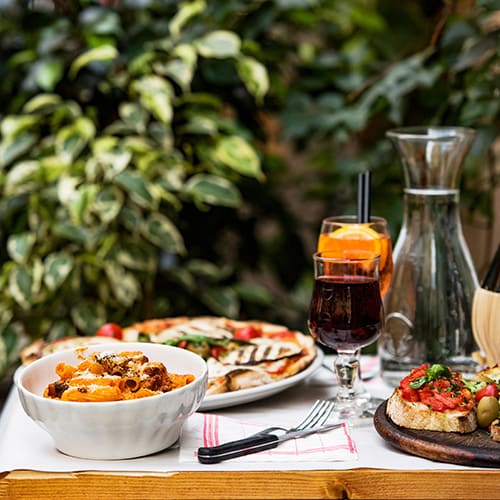 Tablescape of italian foods and drinks