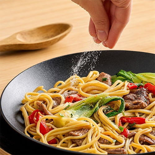 MSG, or monosodium glutamate, is a white, odorless powder composed of sodium and glutamic acid. 
