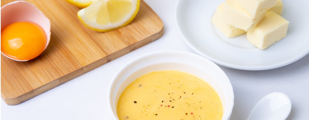 Hollandaise Sauce ingredients on a table top