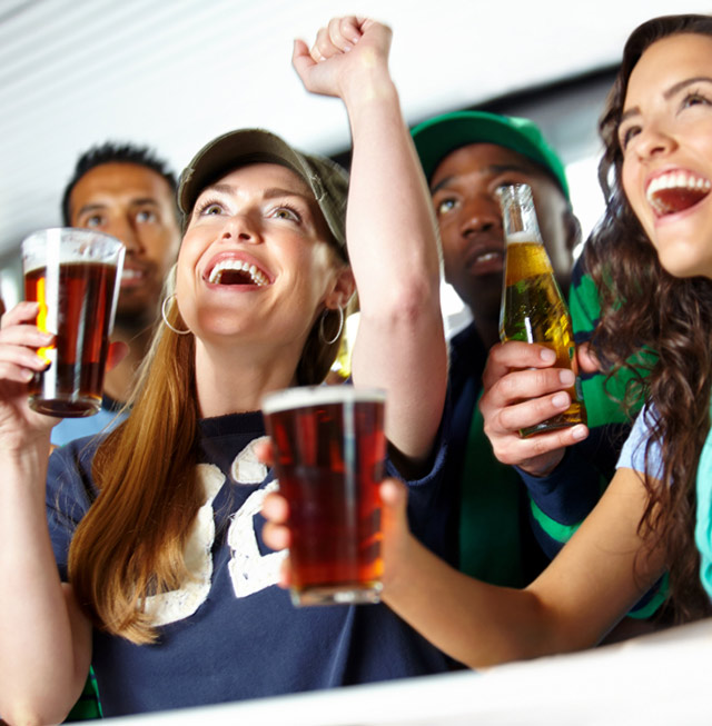 Customers celebrating at a Sports Bar