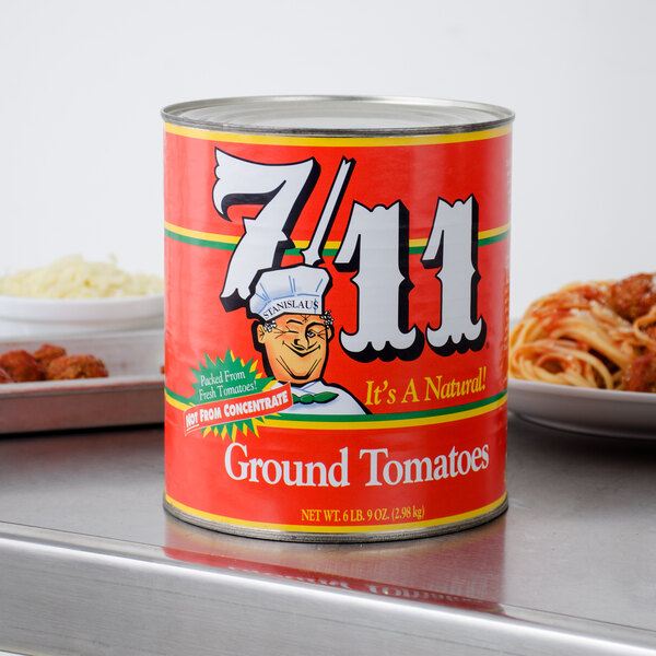 A Stanislaus #10 can of ground tomatoes on a counter.