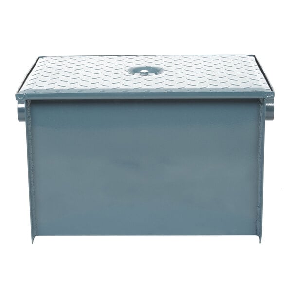 A grey metal Watts grease trap box with a lid.