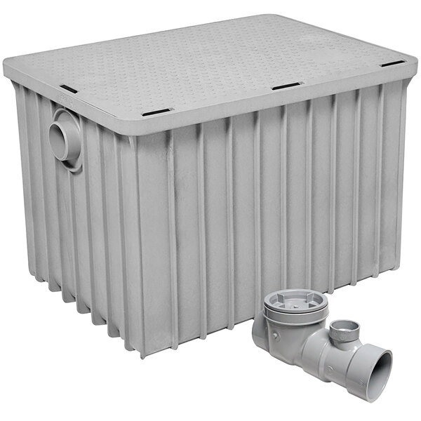 A grey rectangular Endura grease trap with 3" threaded connections and a drain.