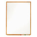 A whiteboard with a wooden frame on a white background.